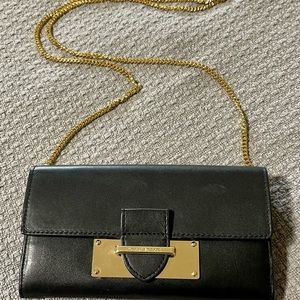 Henri Bendel Black Crossbody Purse with Original gold Chain Strap.